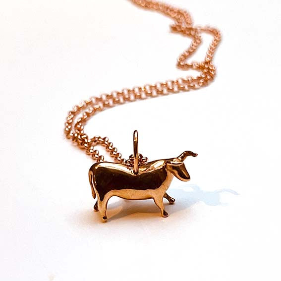 paleolithic bull pendant in bronze by ontogenie