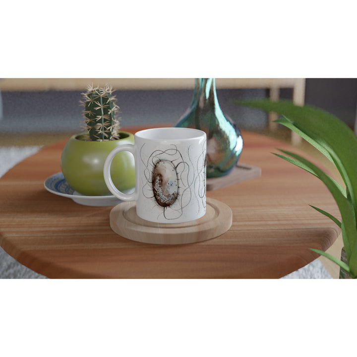 abstract watercolor illustration of E.coli printed on a ceramic mug by ontogenie