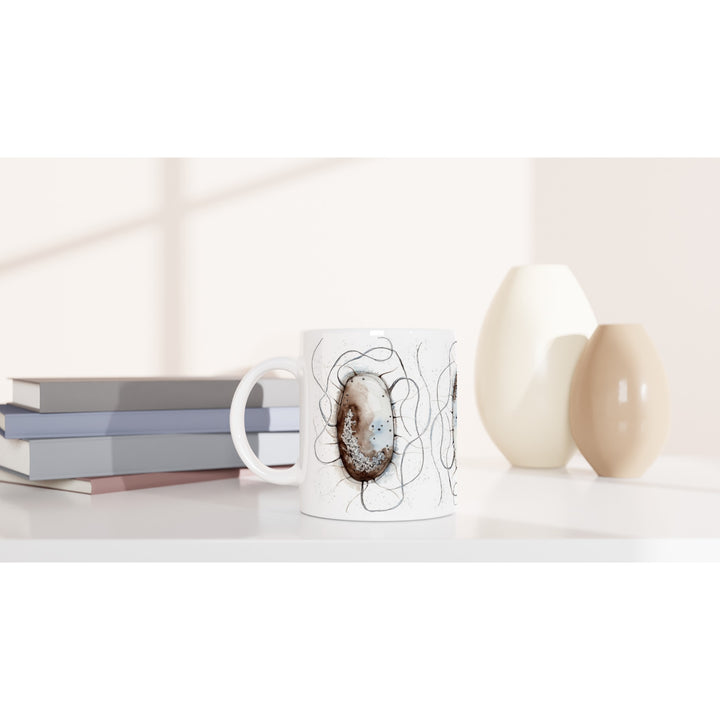 abstract watercolor illustration of E.coli printed on a ceramic mug by ontogenie