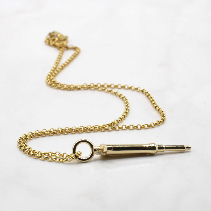 pipette pendant in 14K gold plated brass by ontogenie