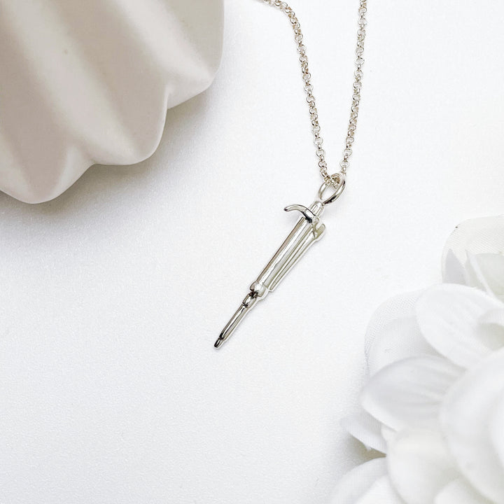 pipette pendant in silver by ontogenie