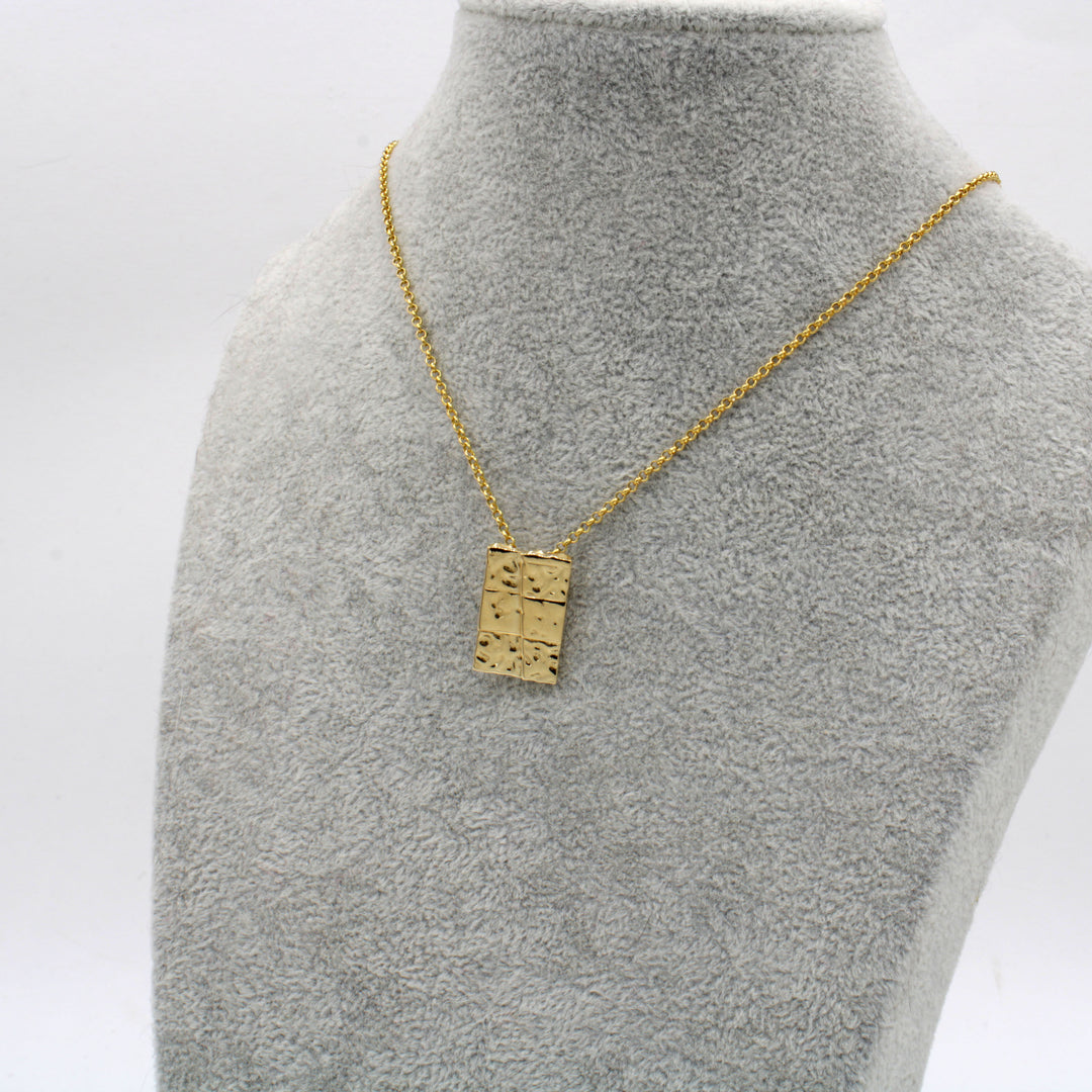strike slip pendant in 14K gold plated brass ontogenie science jewelry