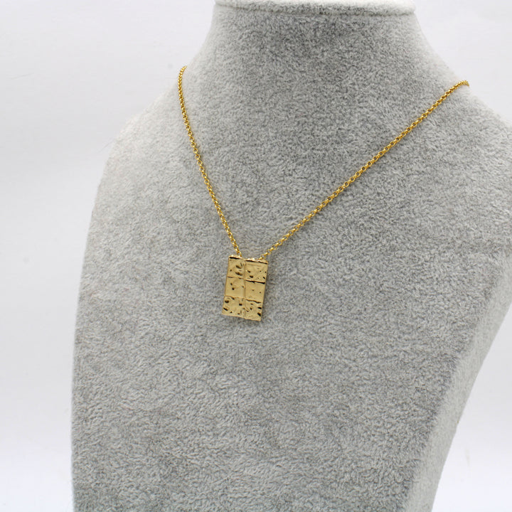 strike slip pendant in 14K gold plated brass ontogenie science jewelry