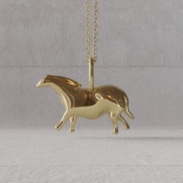 paleolithic horse pendant gold plated brass rotate video