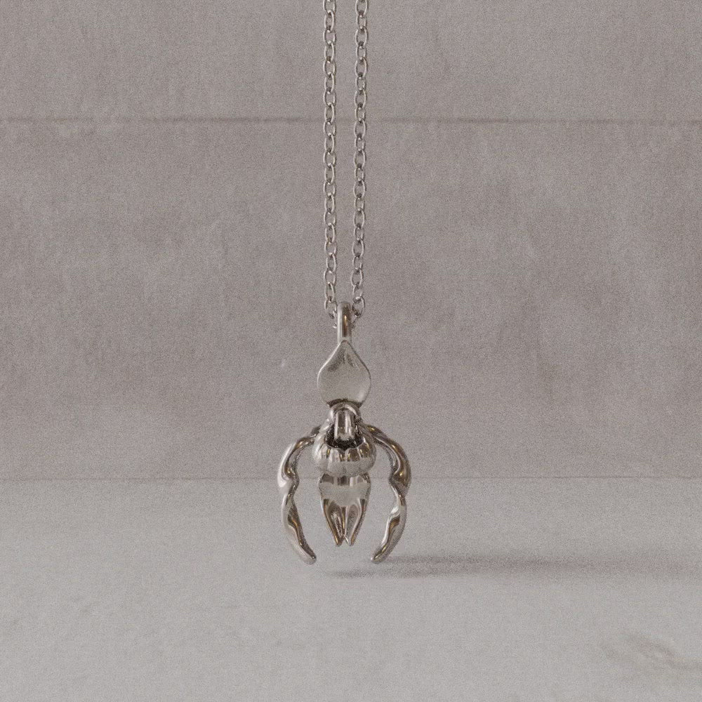 Lady's slipper pendant in sterling silver rotation video Ontogenie Science Jewelry
