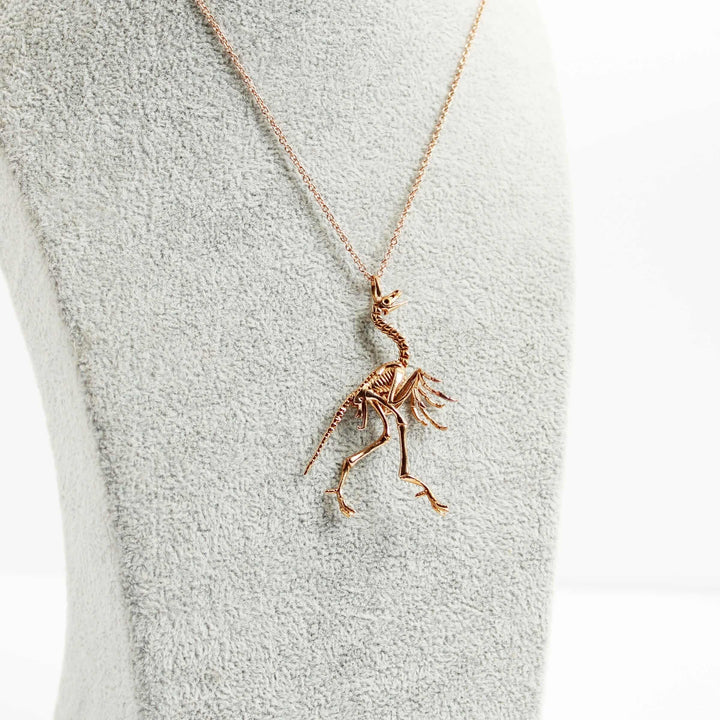 bronze archaeopteryx fossil pendant