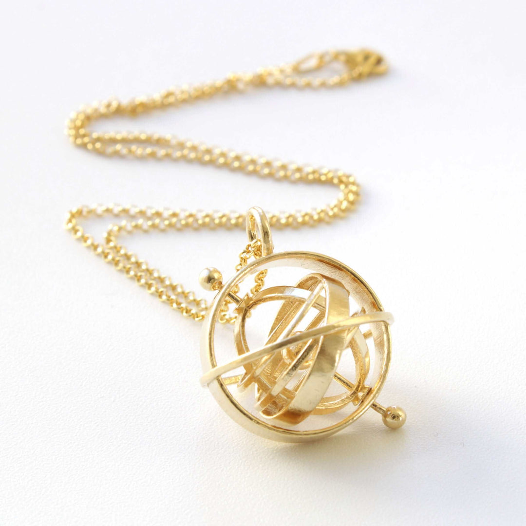 armillary sphere astronomical instrument by ontogenie science jewelry