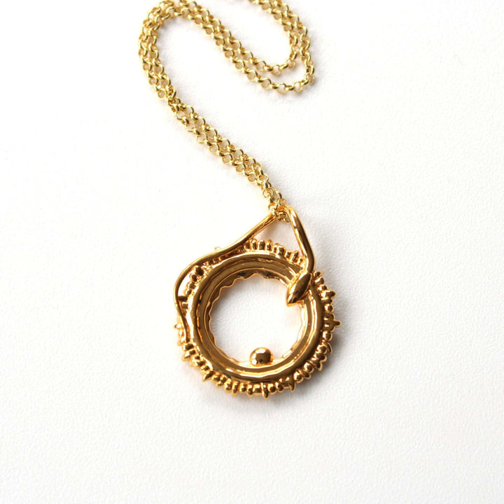 conception pendant in 14K gold plated brass ontogenie science jewelry