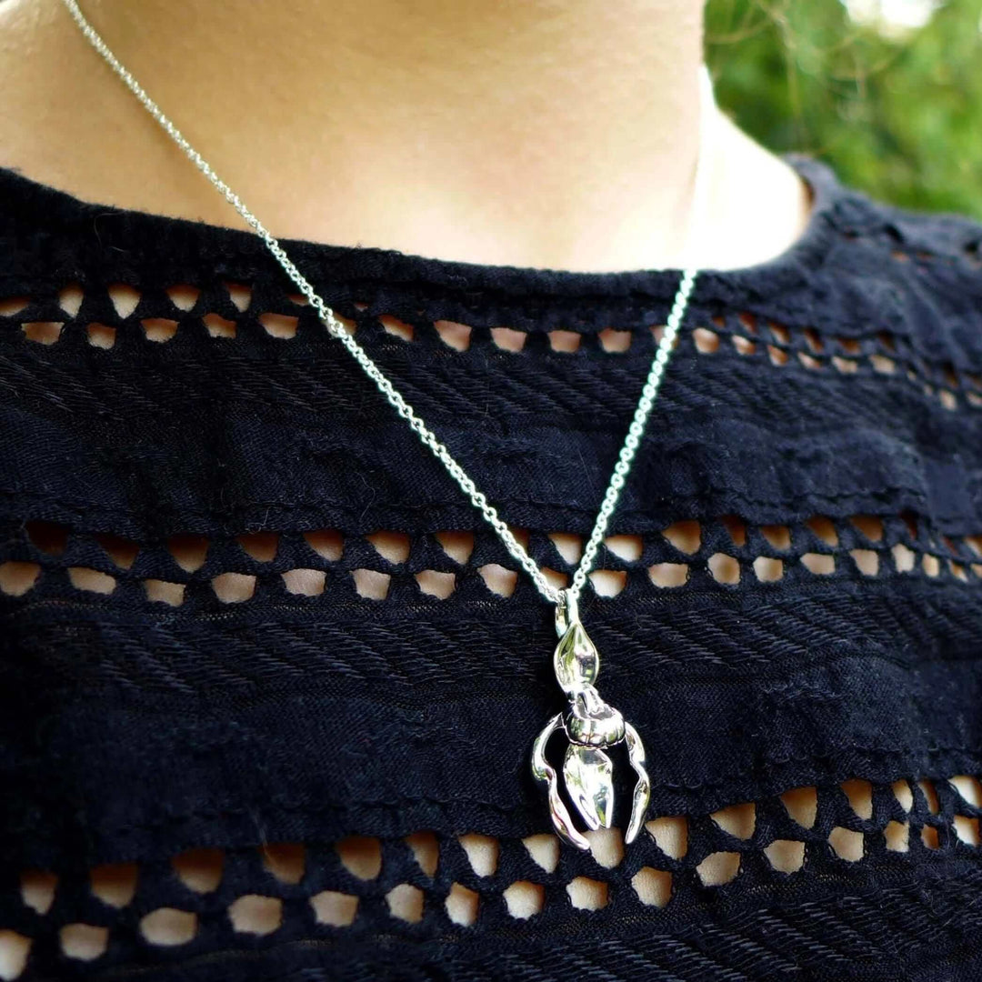 cypripedium lady's slipper orchid pendant in silver ontogenie science jewelry
