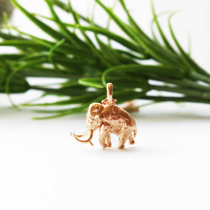 Woolly mammoth pendants in bronze Ontogenie Science Jewelry