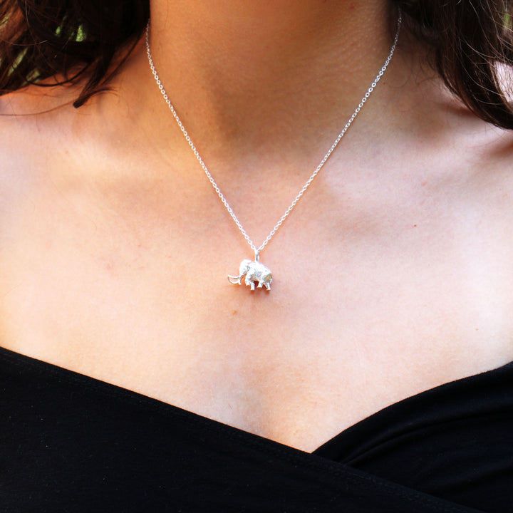 mammoth pendant in sterling silver on model by Ontogenie
