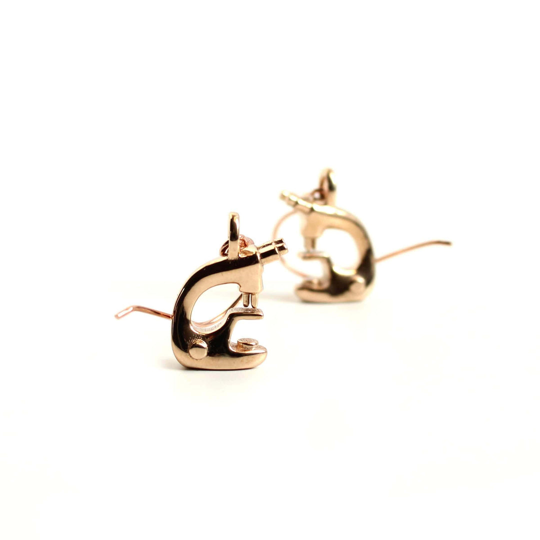 microscope earrings in bronze ontogenie science jewelry