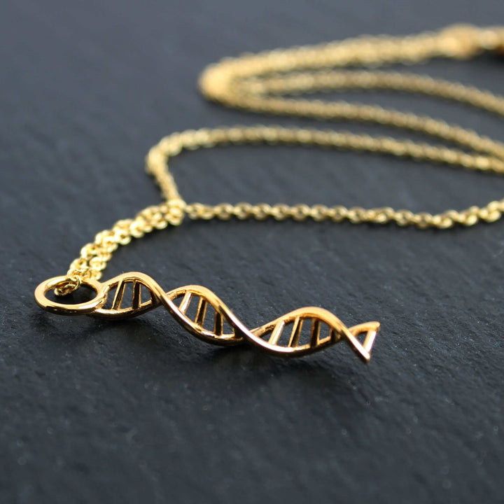 DNA pendant gold plated brass Ontogenie