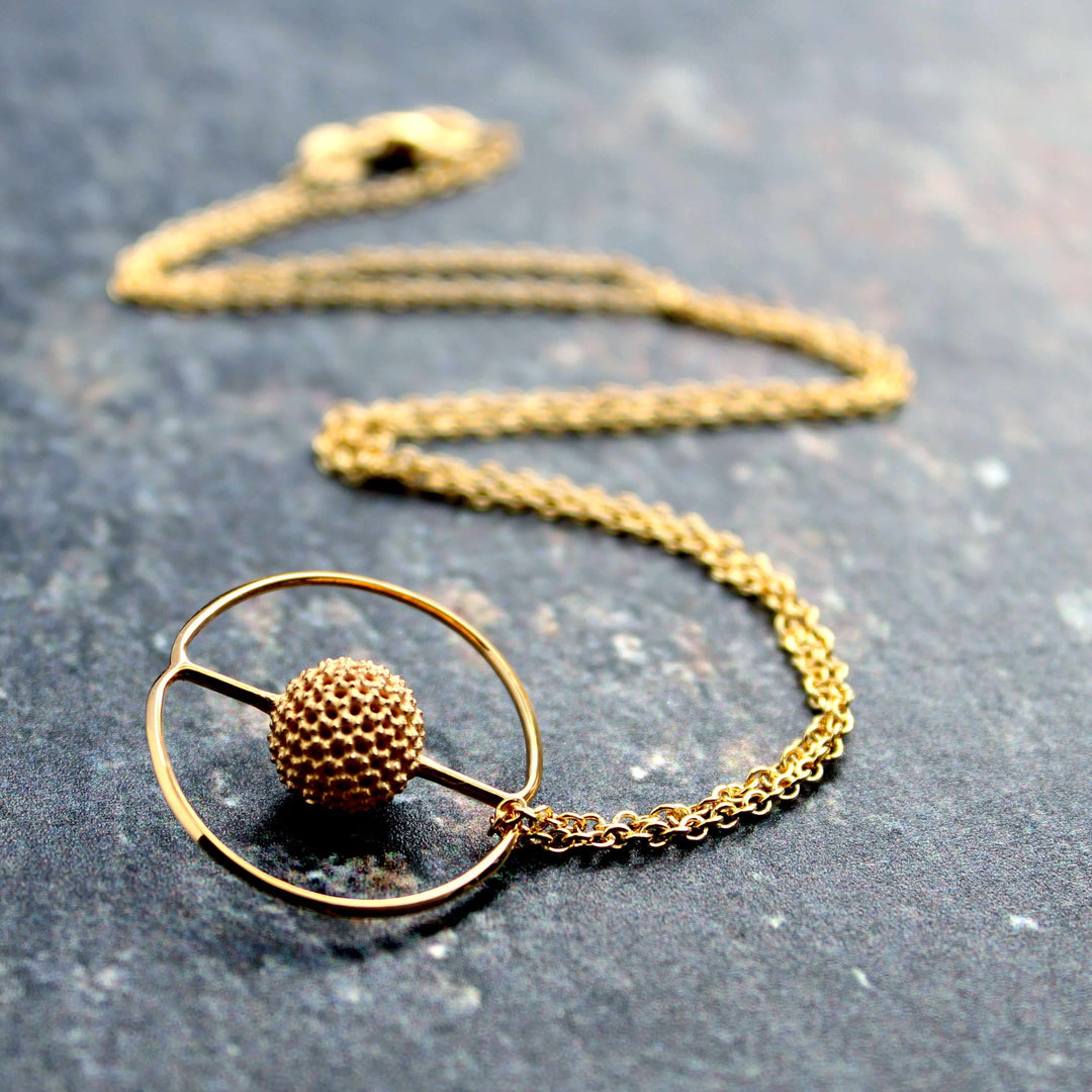 Saturnalis circularis radiolarian pendant 14K gold plated brass