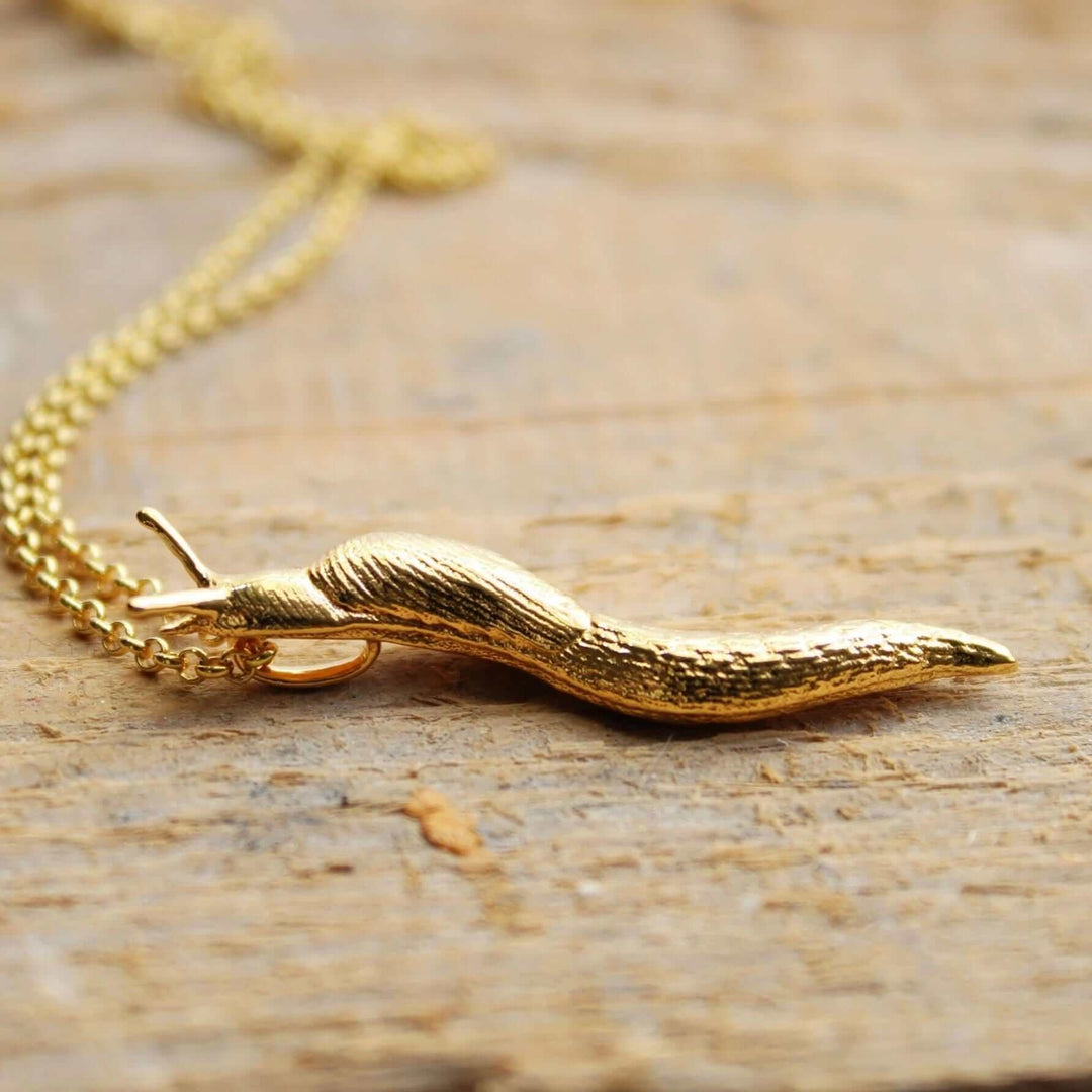 slug pendant ontogenie science jewelry mollusk biology