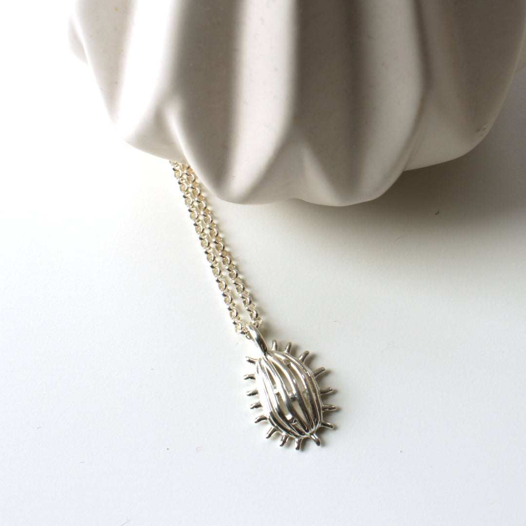 new tetrahymena pendant small silver by Ontogenie Science Jewelry