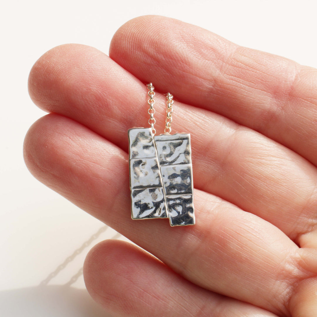 Dip slip fault pendant in sterling silver by ontogenie science jewelry
