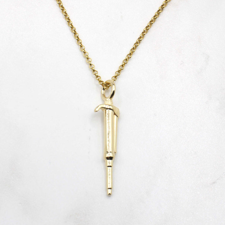 pipette pendant in 14K gold plated brass by ontogenie
