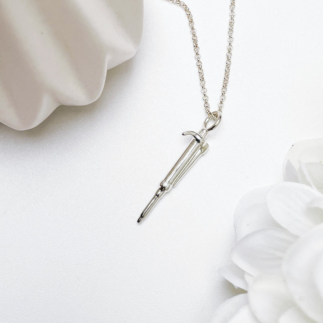 pipette pendant in silver by ontogenie