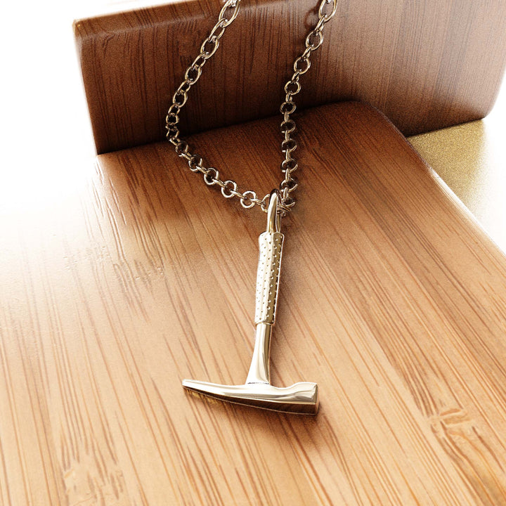 computer render of sterling silver rock hammer pendant by ontogenie science jewelry