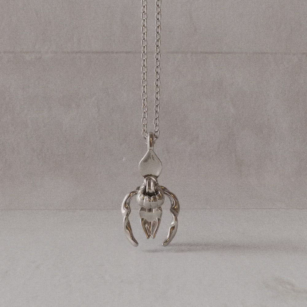 Lady's slipper pendant in sterling silver rotation video Ontogenie Science Jewelry
