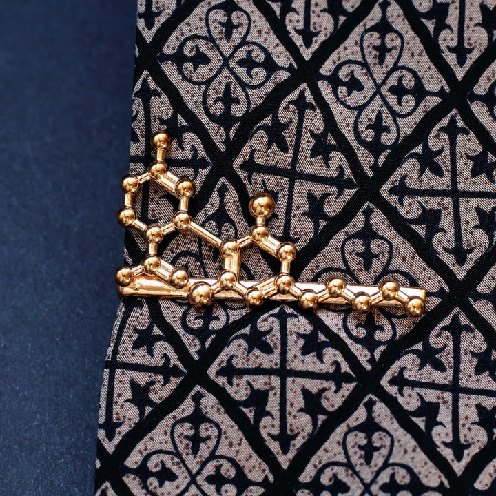 CBD Cannabidiol tie clip for men in bronze Ontogenie Science Jewelry