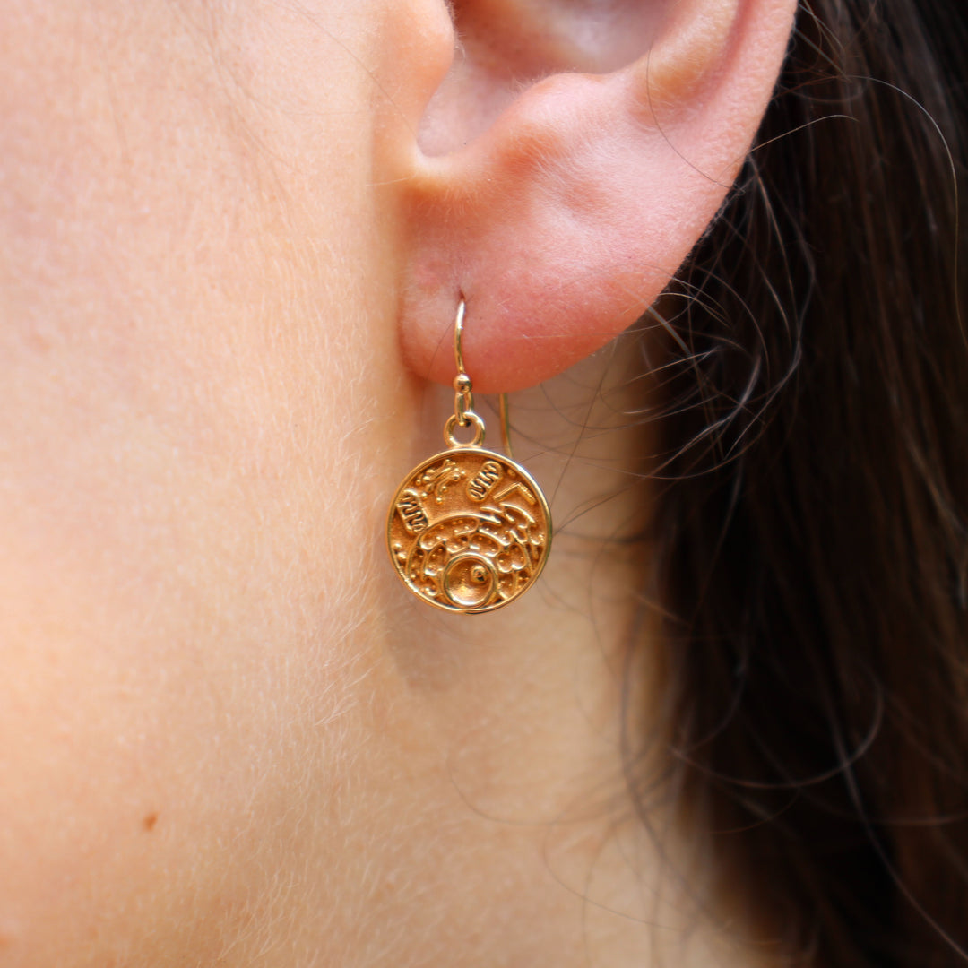 animal cell earrings in gold plated brass on model by Ontogenie