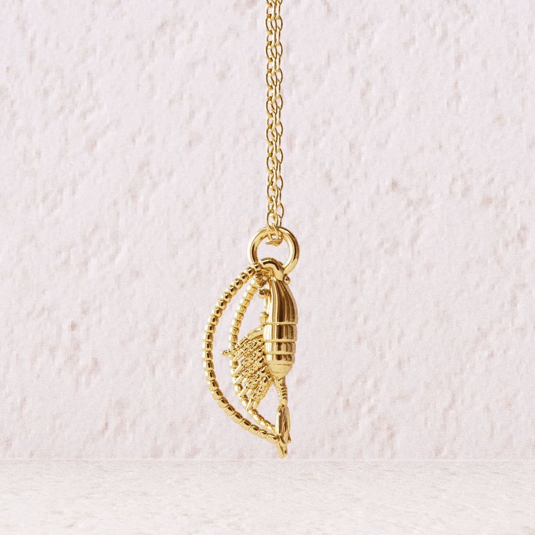 Calanoida copepod pendant 14K goldplated brass render by Ontogenie Science Jewelry