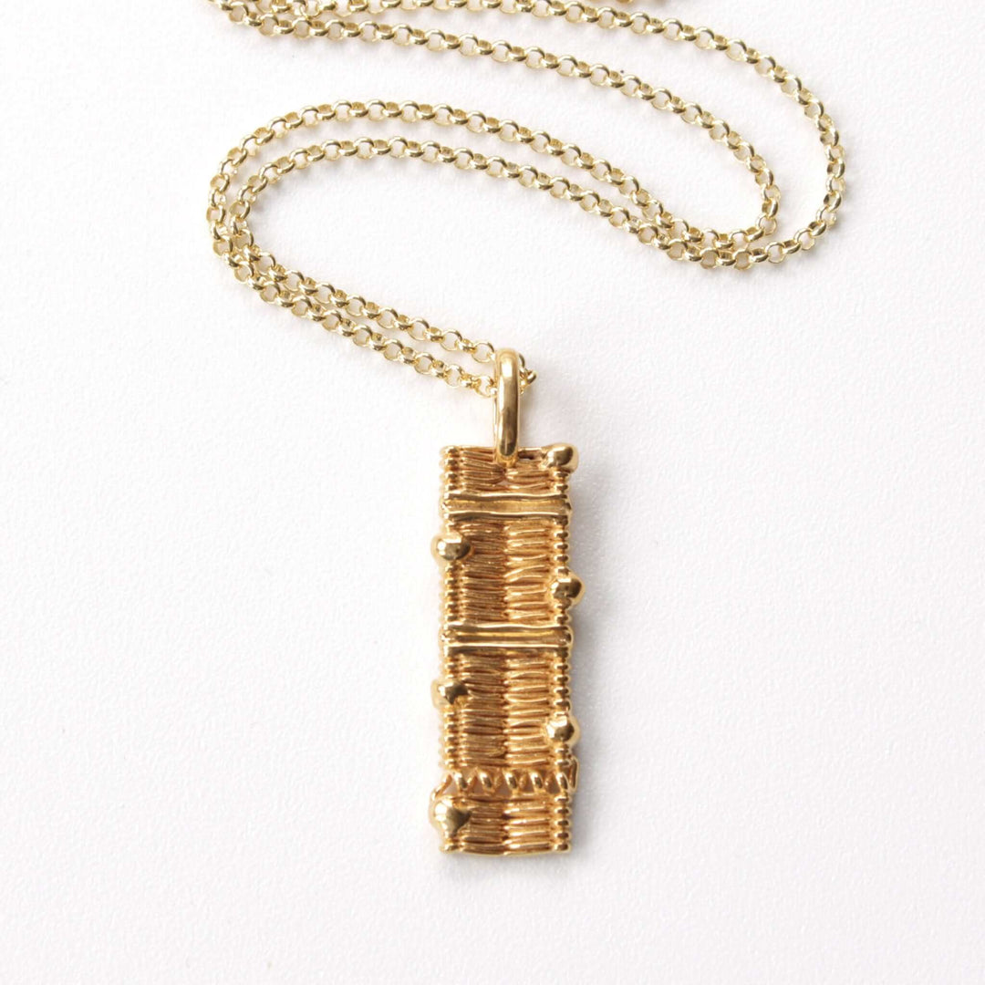 cell membrane pendant in 14K gold plated brass Ontogenie Science Jewelry
