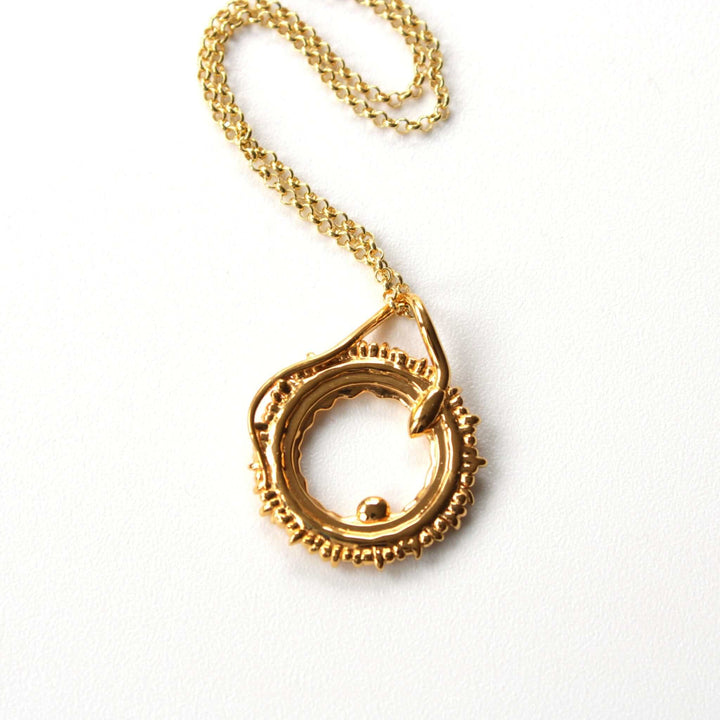 conception pendant in 14K gold plated brass ontogenie science jewelry