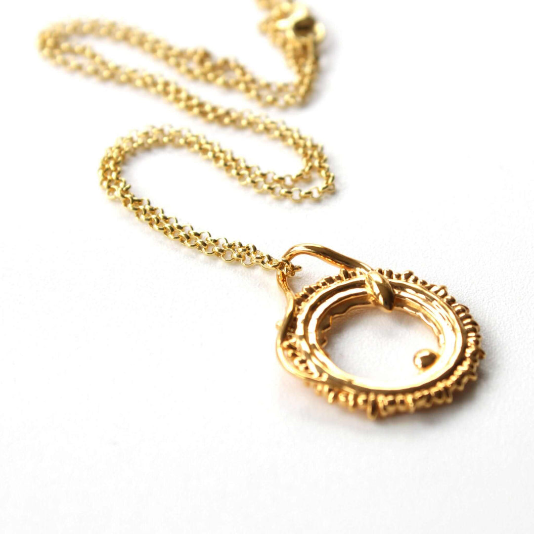 conception pendant in 14K gold plated brass ontogenie science jewelry