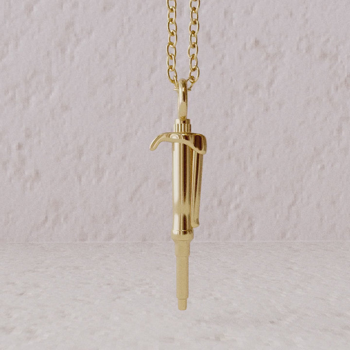 pipette pendant gold computer render rotate videoontogenie