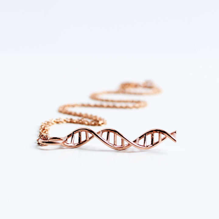 DNA pendant rose gold plated brass Ontogenie