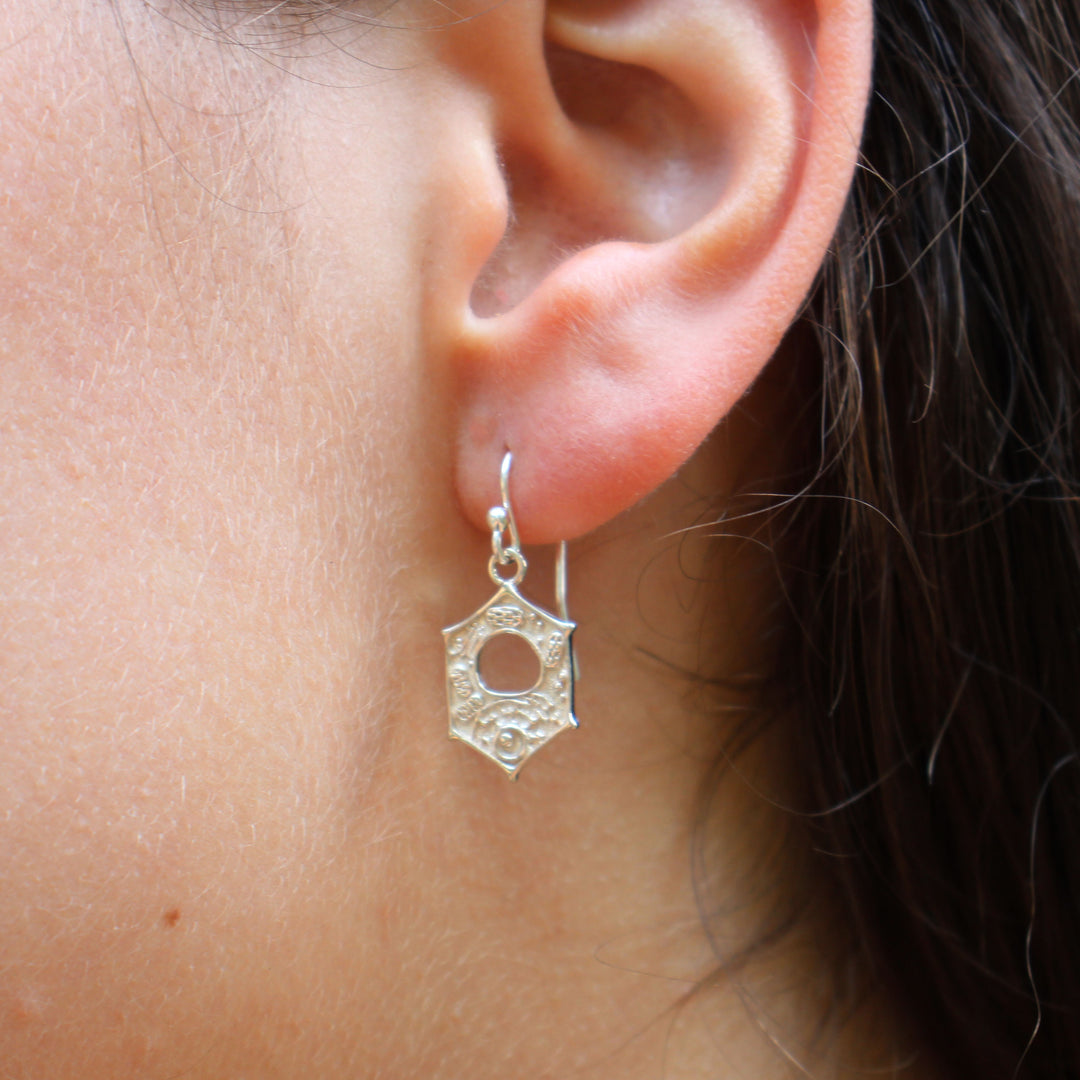 plant cell earrings in sterling silver on model by Ontogenie